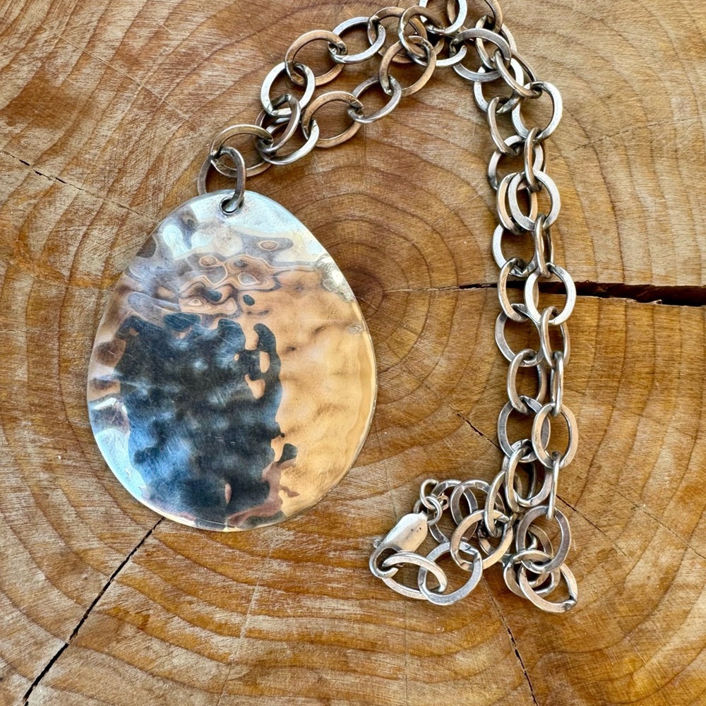 Silas’s sterling silver hammered pendant necklace retired 2007